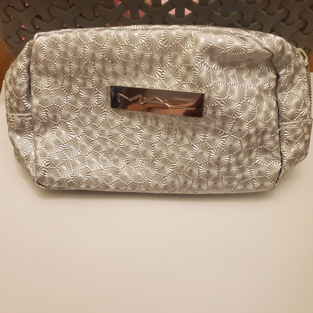 Complimentary MAC Makeup Bag For MAC PURCHASE OF $85.